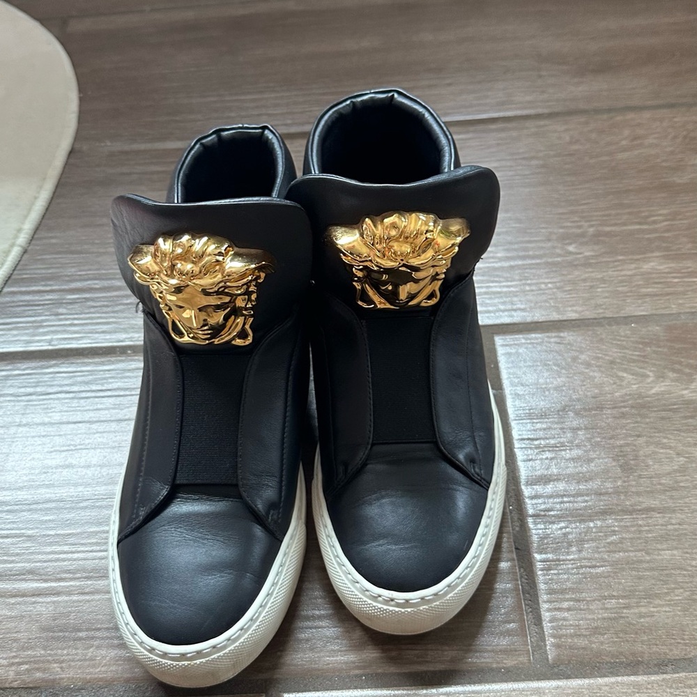 Versace black, gold and white slip on high top palazzo sneakers